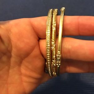 Set of three gold bangle bracelets